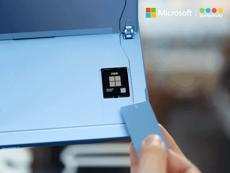 Tháo nắp thay thế bộ nhớ SSD trên Surface Pro 9